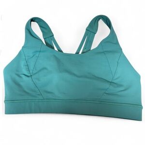 Lululemon Teal Sports Bra, size 12. Padding has been removed. Like new!